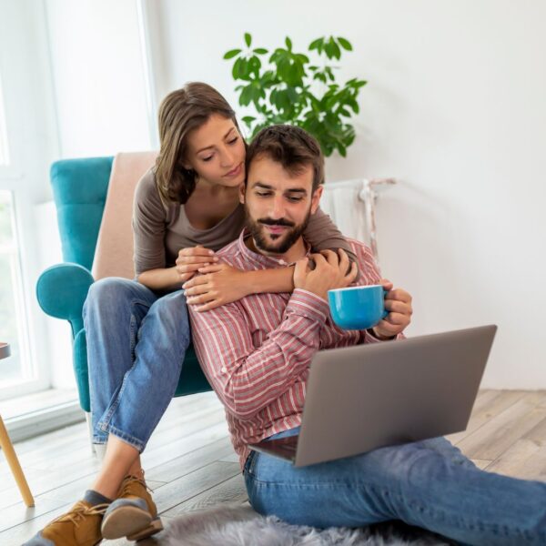 happy couple in new apartment