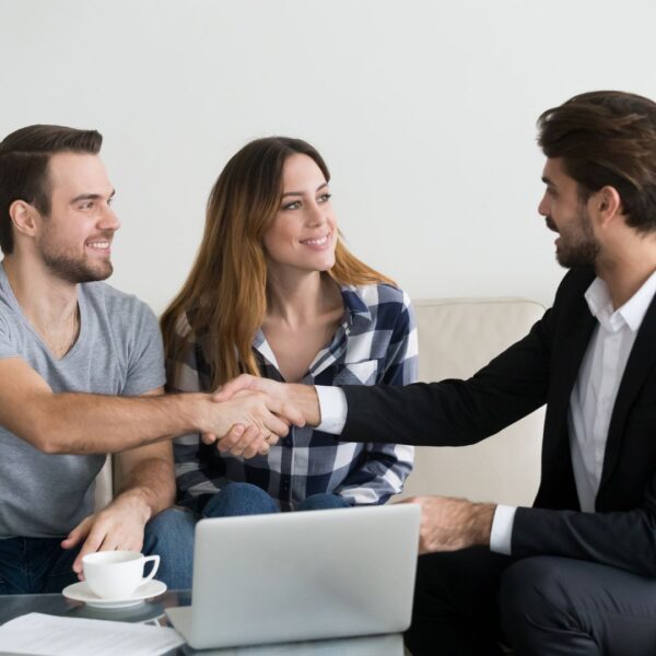 couple meeting with realtor