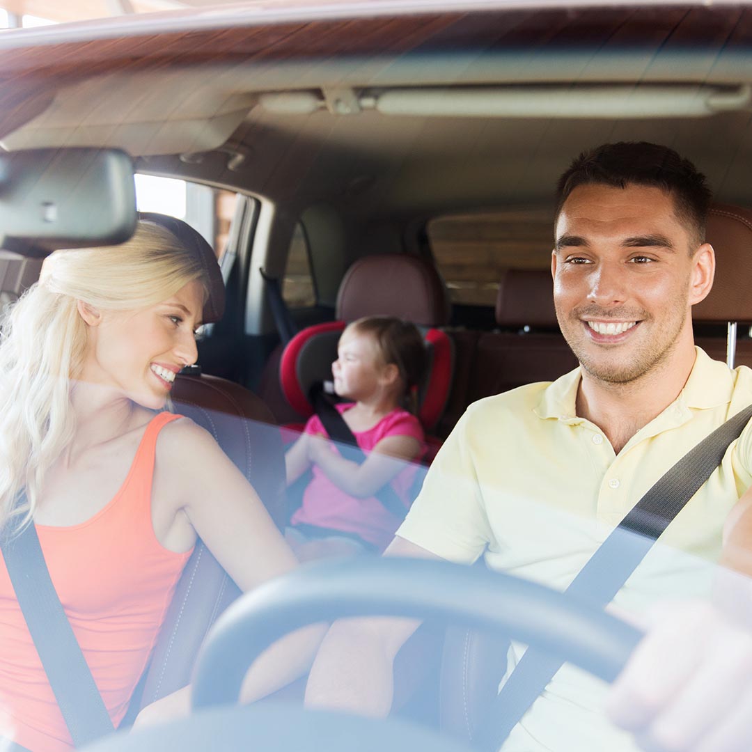 happy family in a car
