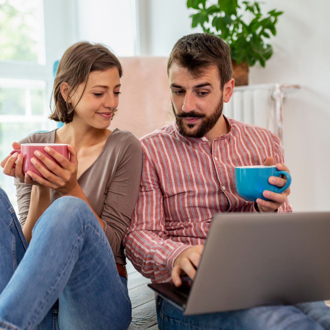 young couple on laptop