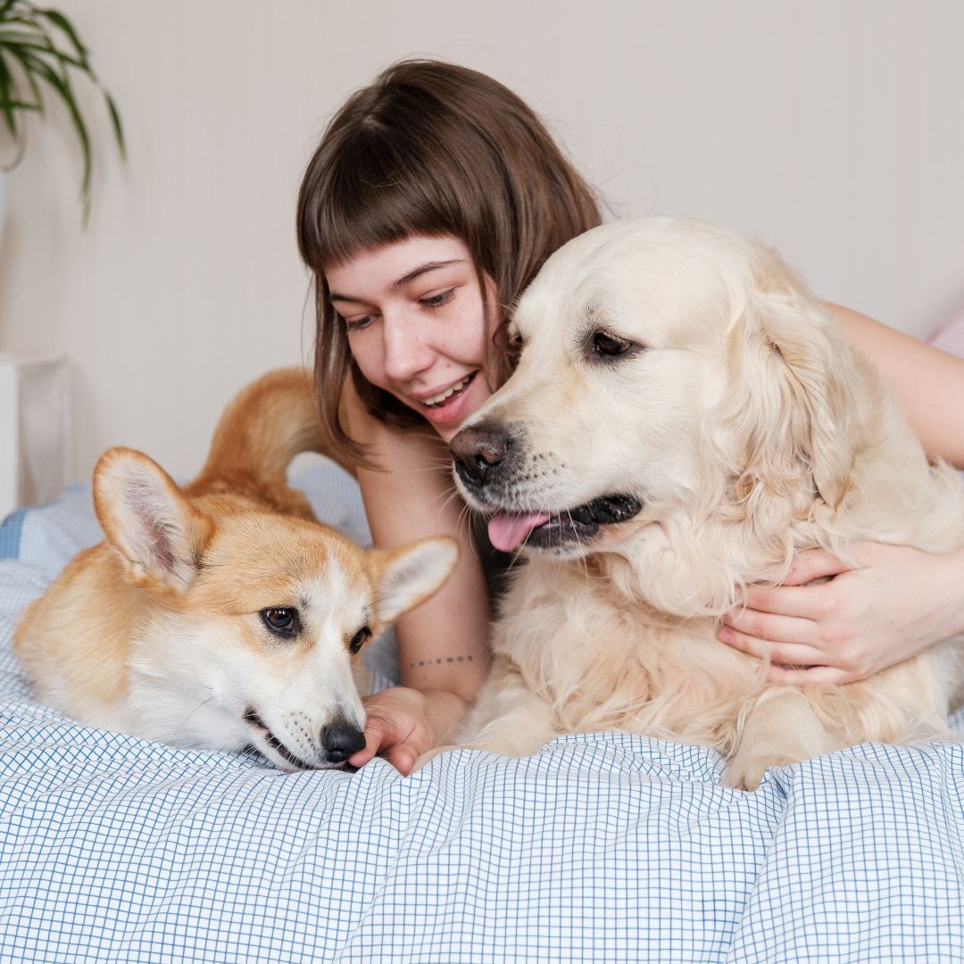 woman with two dogs