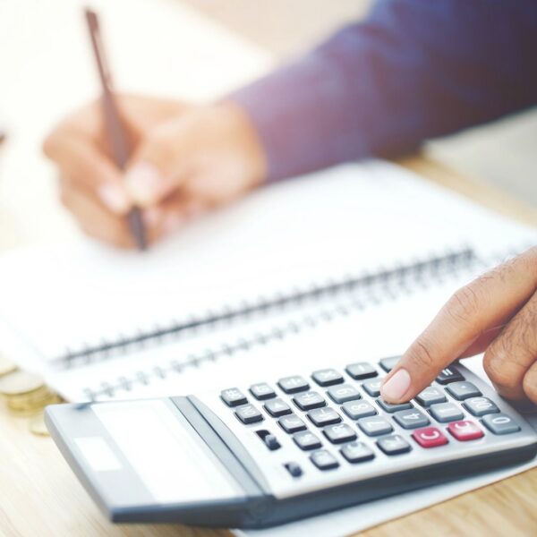 Person looking at calculator