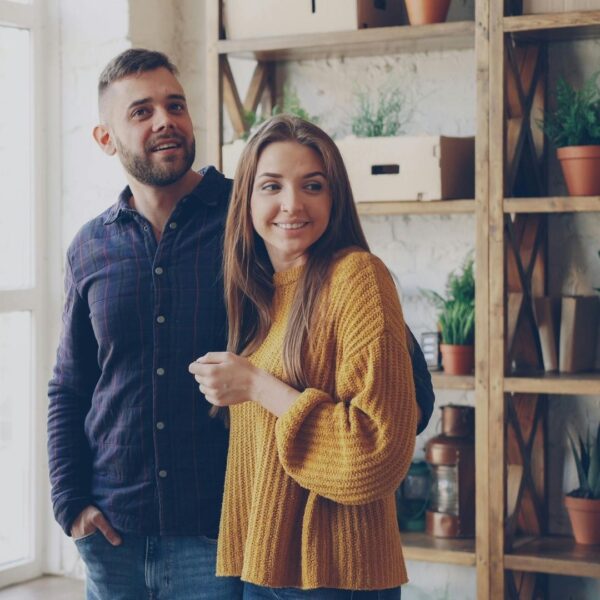A couple touring an apartment.